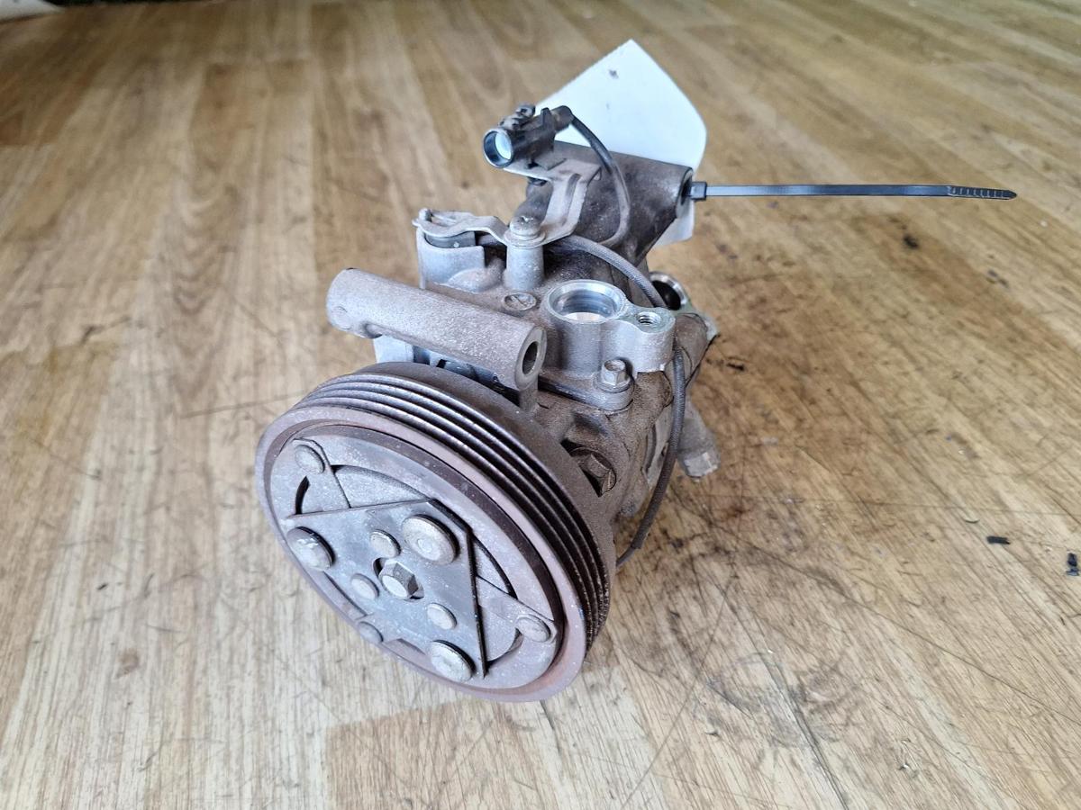 1000904866-A/C Compressor Top