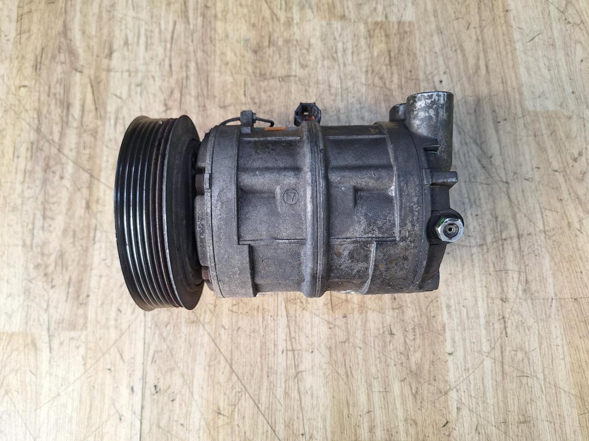 1000927899-A/C Compressor Top