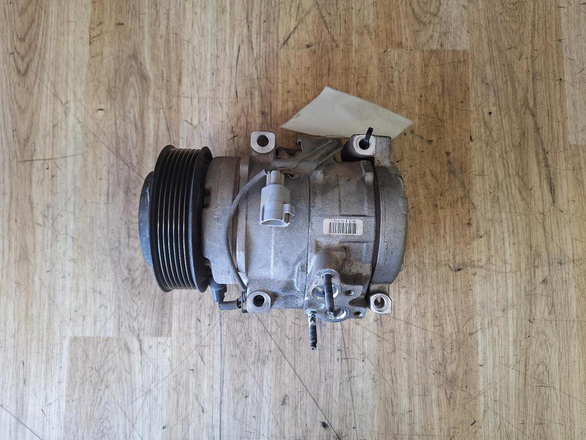1000901144-A/C Compressor Top