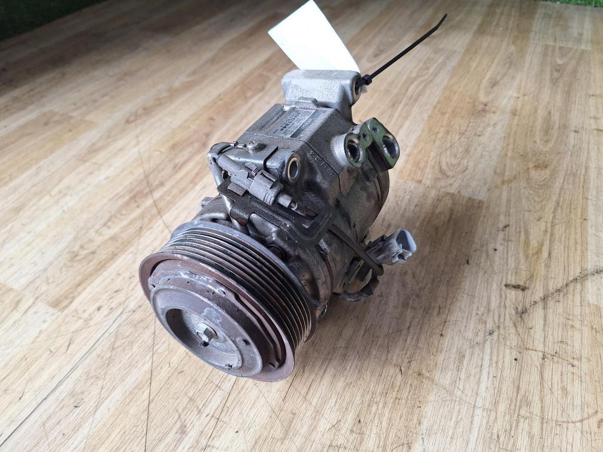 1000897694-A/C Compressor Top