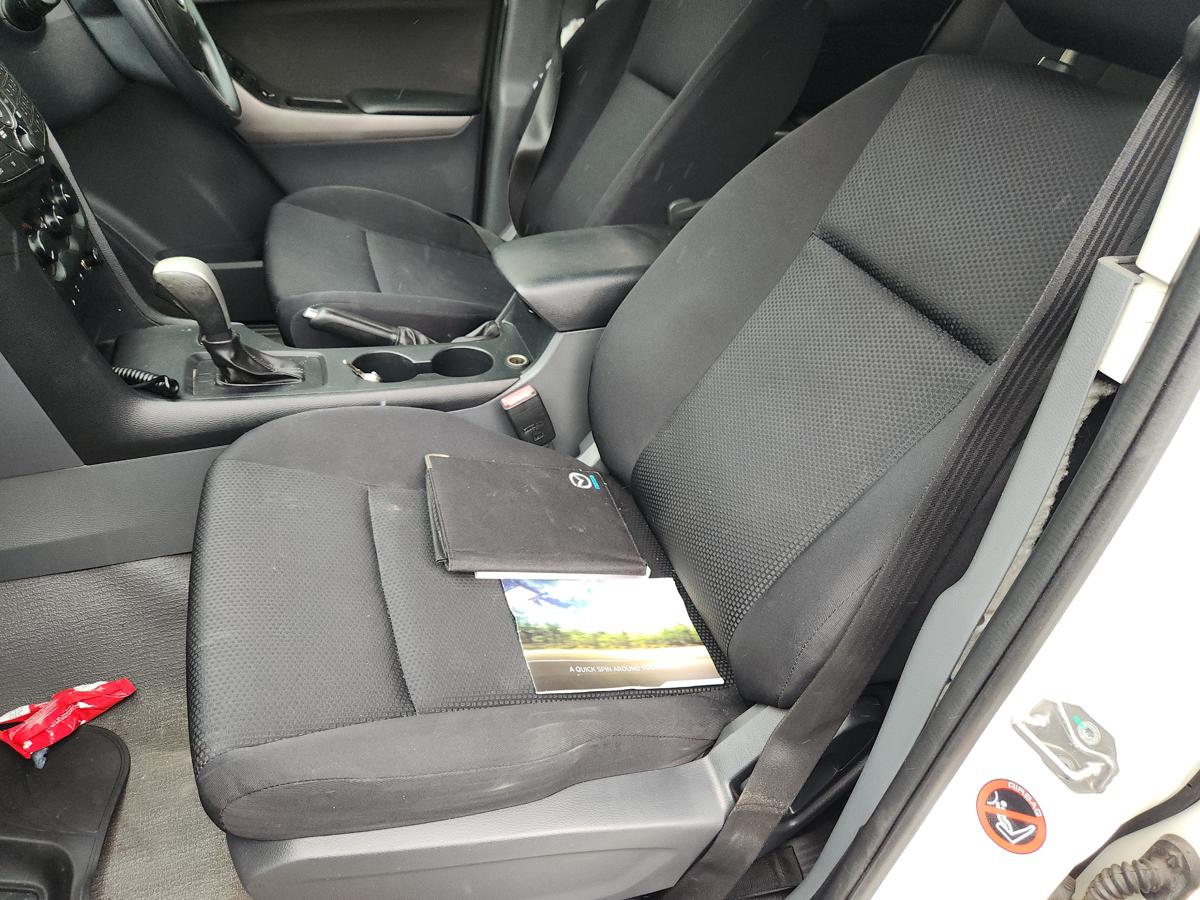 1000936452-Front Seat Left