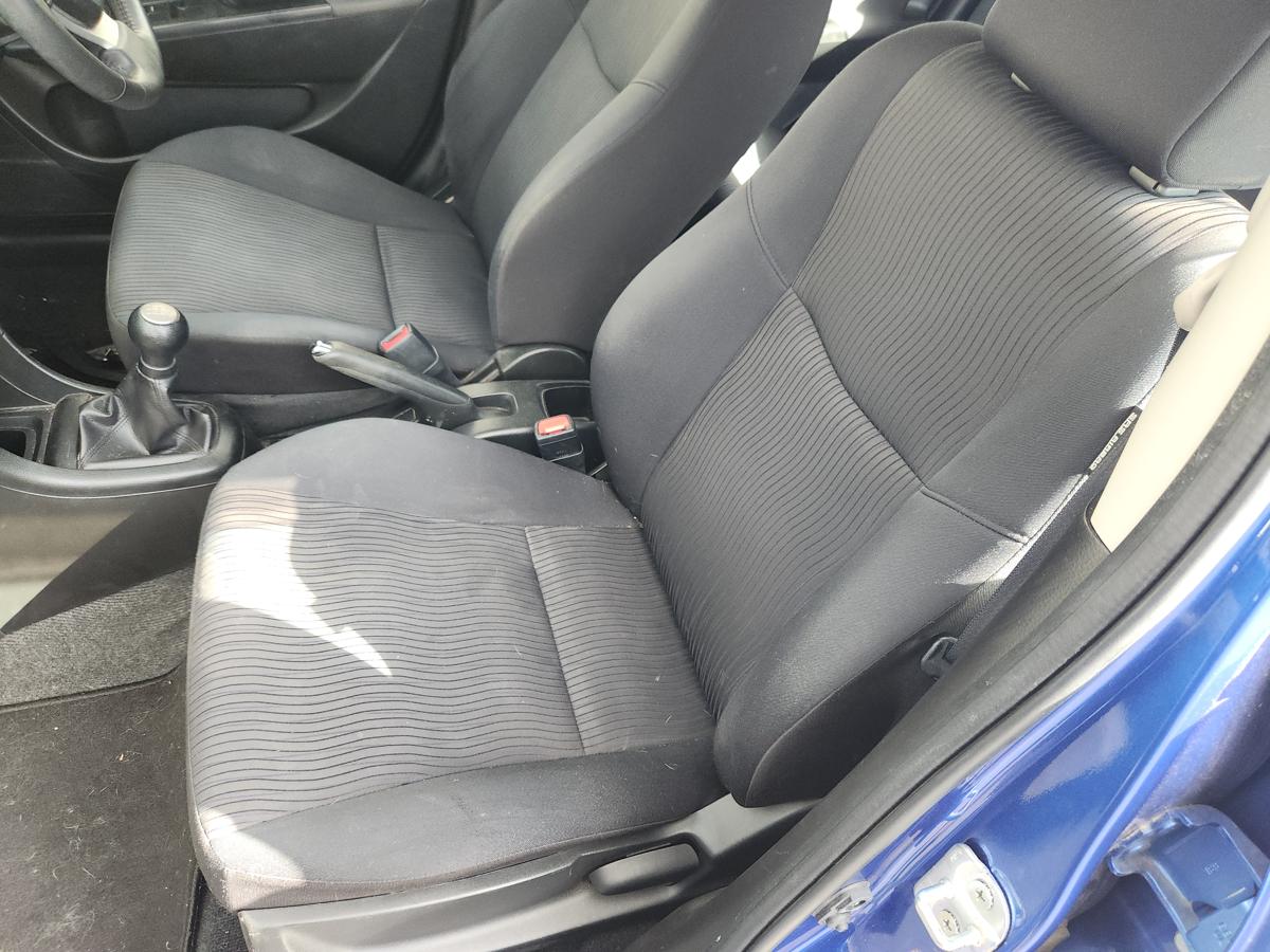 1000946653-Front Seat Left