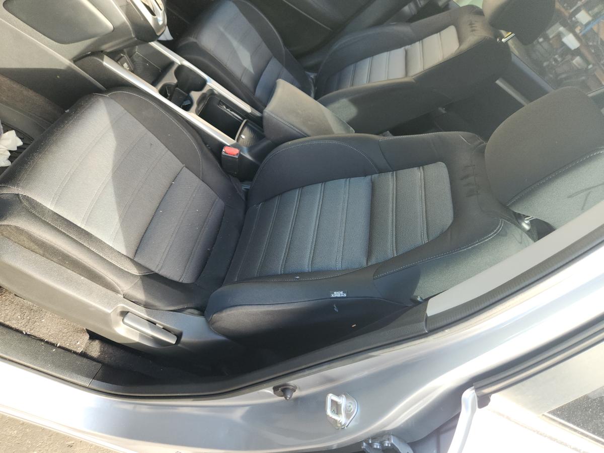 1000932173-Front Seat Left