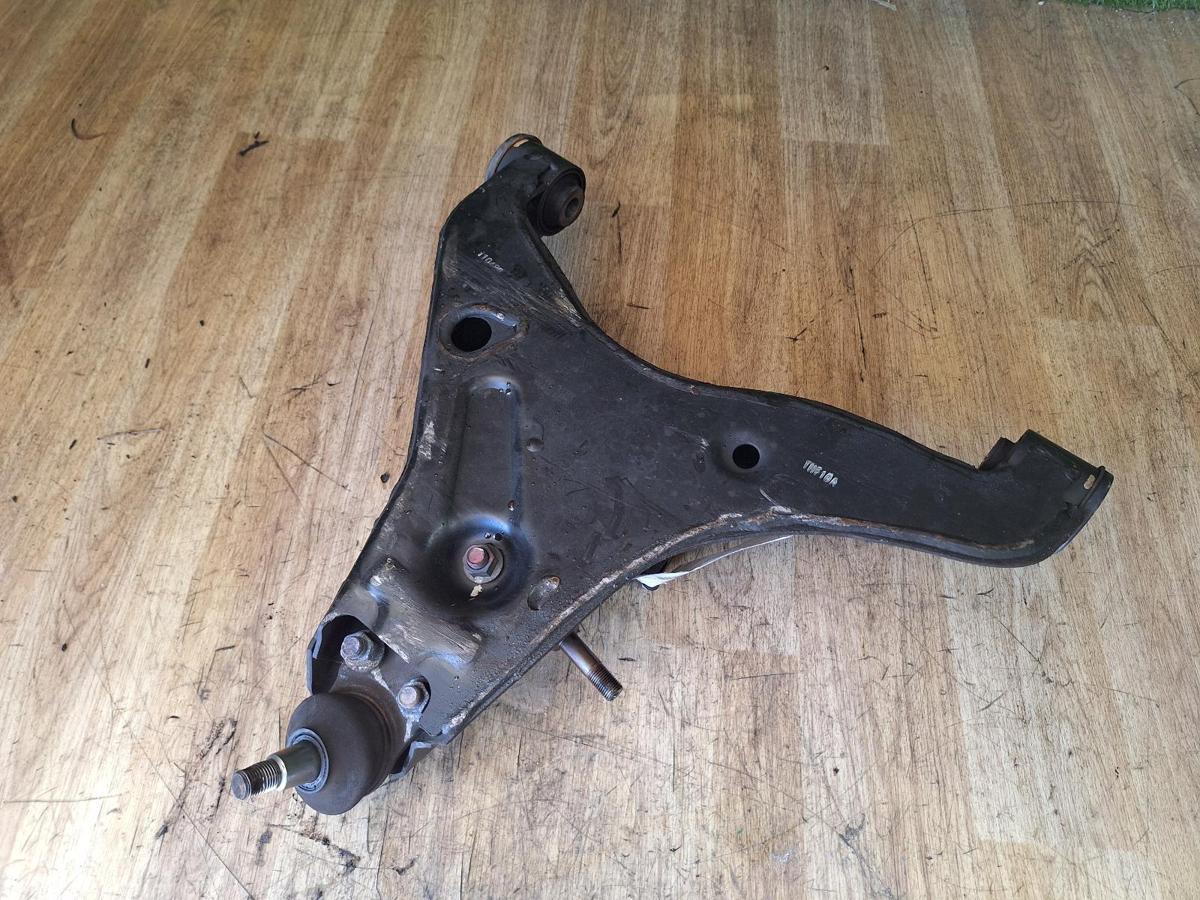 1000918271-Left Front Lower Control Arm Rear Top