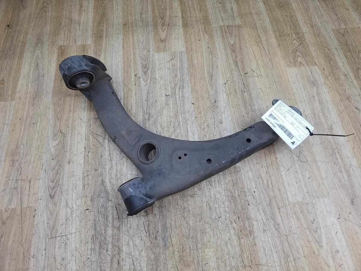 1000934122-Left Front Lower Control Arm Top