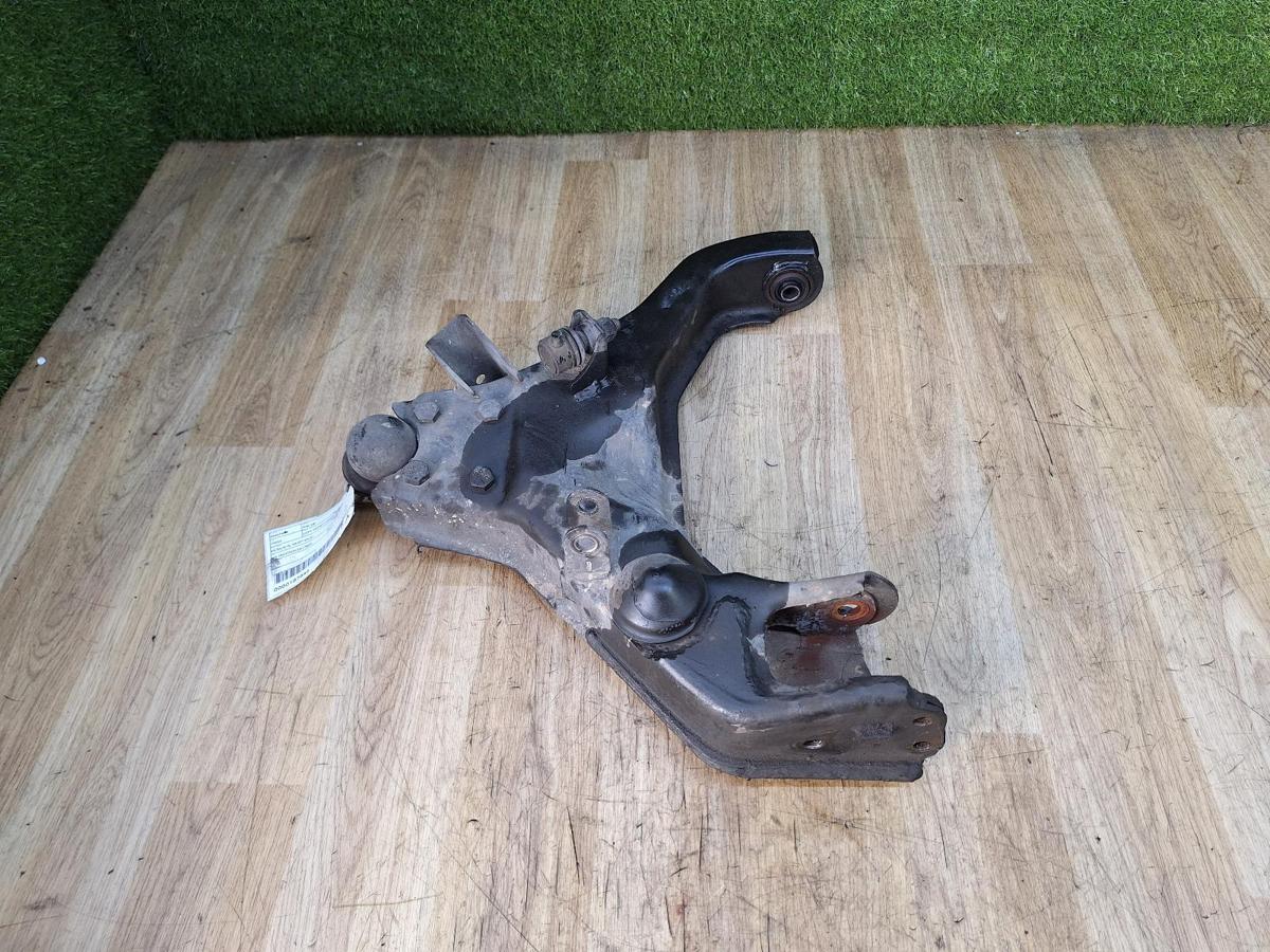 1000934786-Left Front Lower Control Arm Top