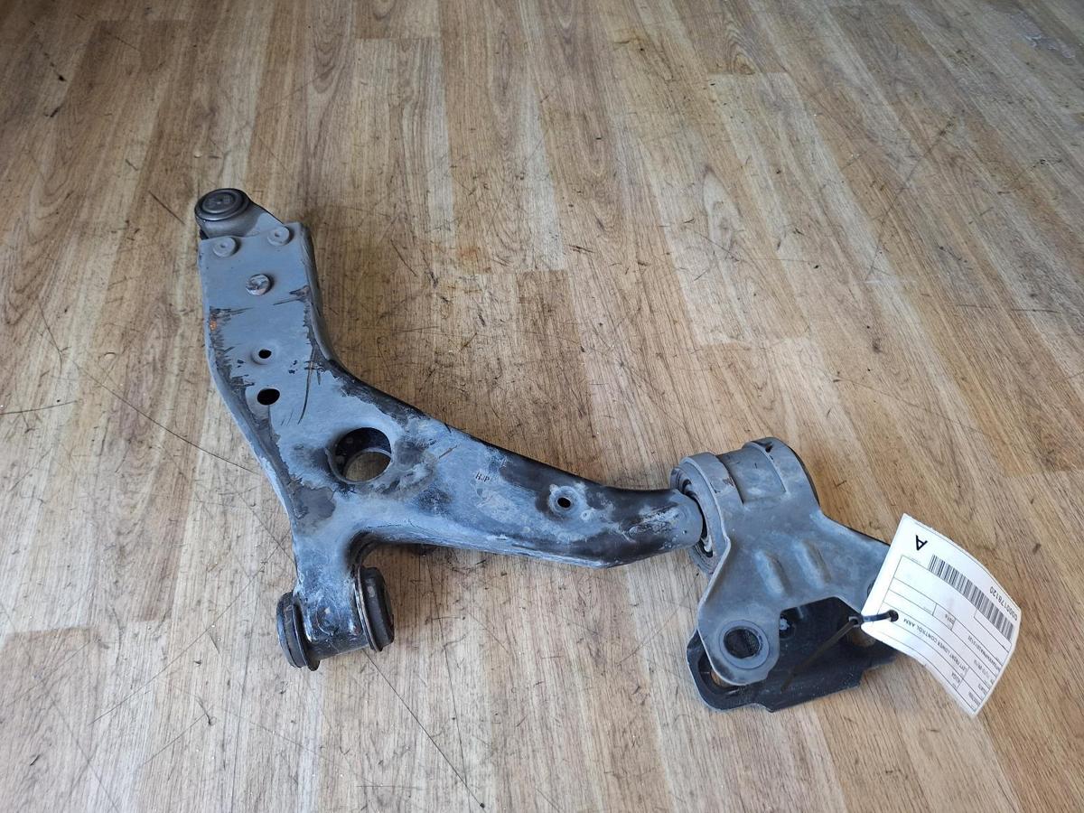 1000883847-Left Front Lower Control Arm Top