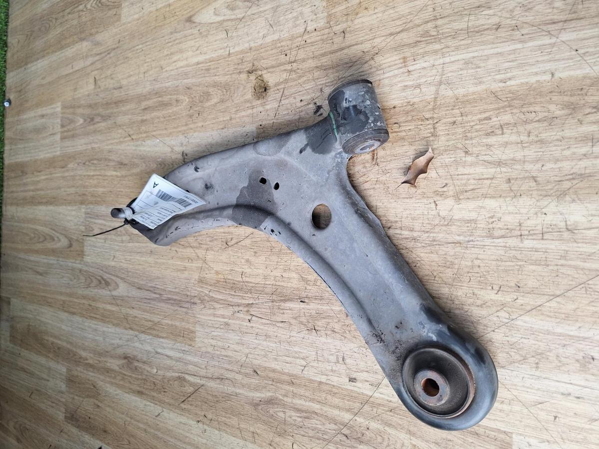 1000884962-Left Front Lower Control Arm Top