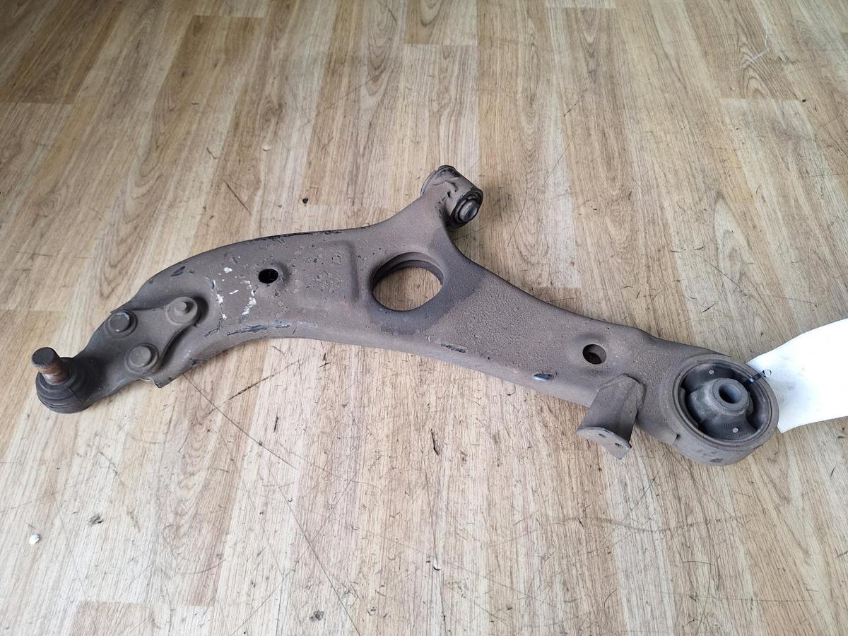 1000890012-Left Front Lower Control Arm Top