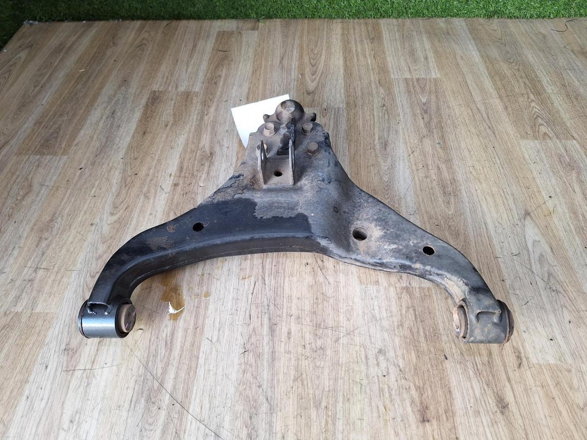 1000882811-Left Front Lower Control Arm Top