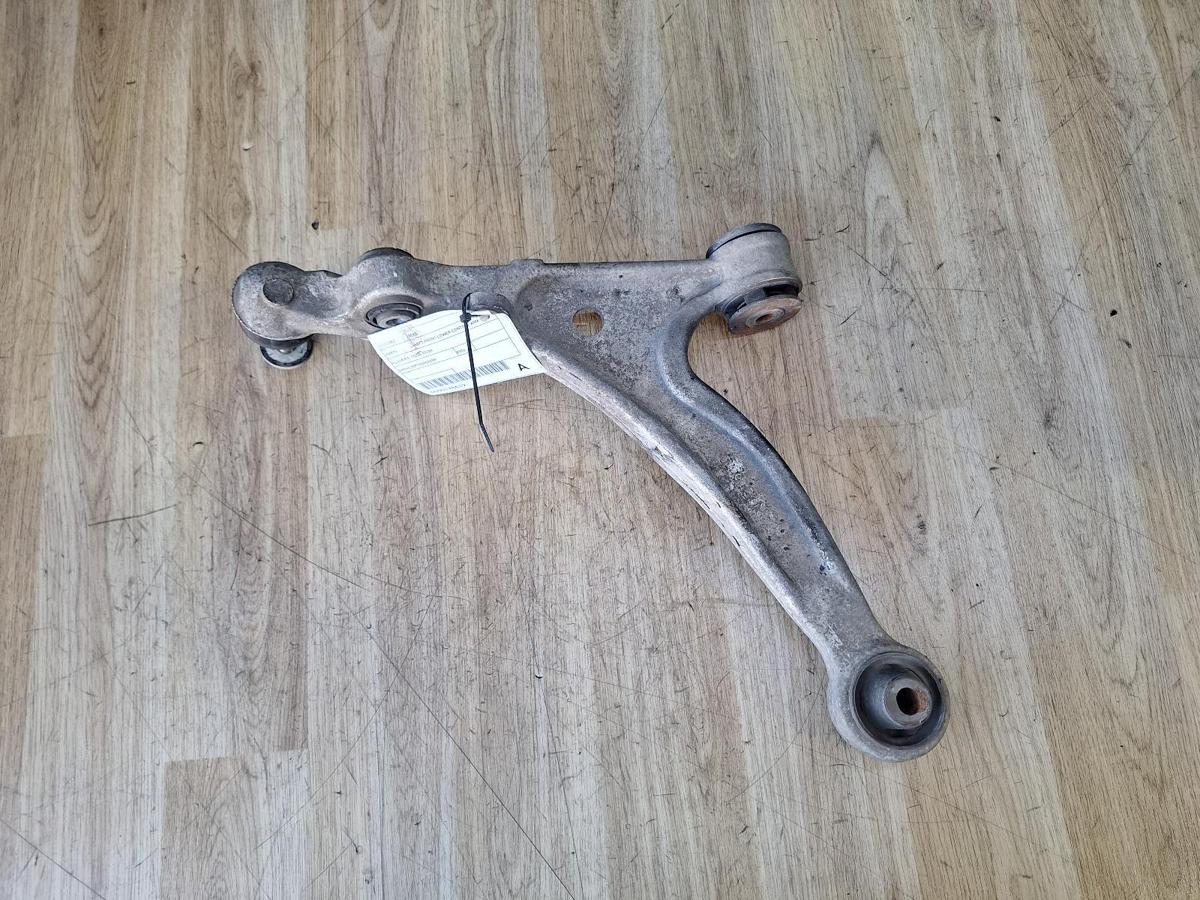 1000887511-Left Front Lower Control Arm Top
