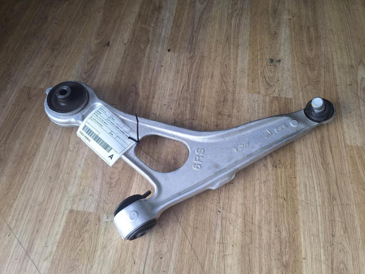 1000899062-Left Front Lower Control Arm Top