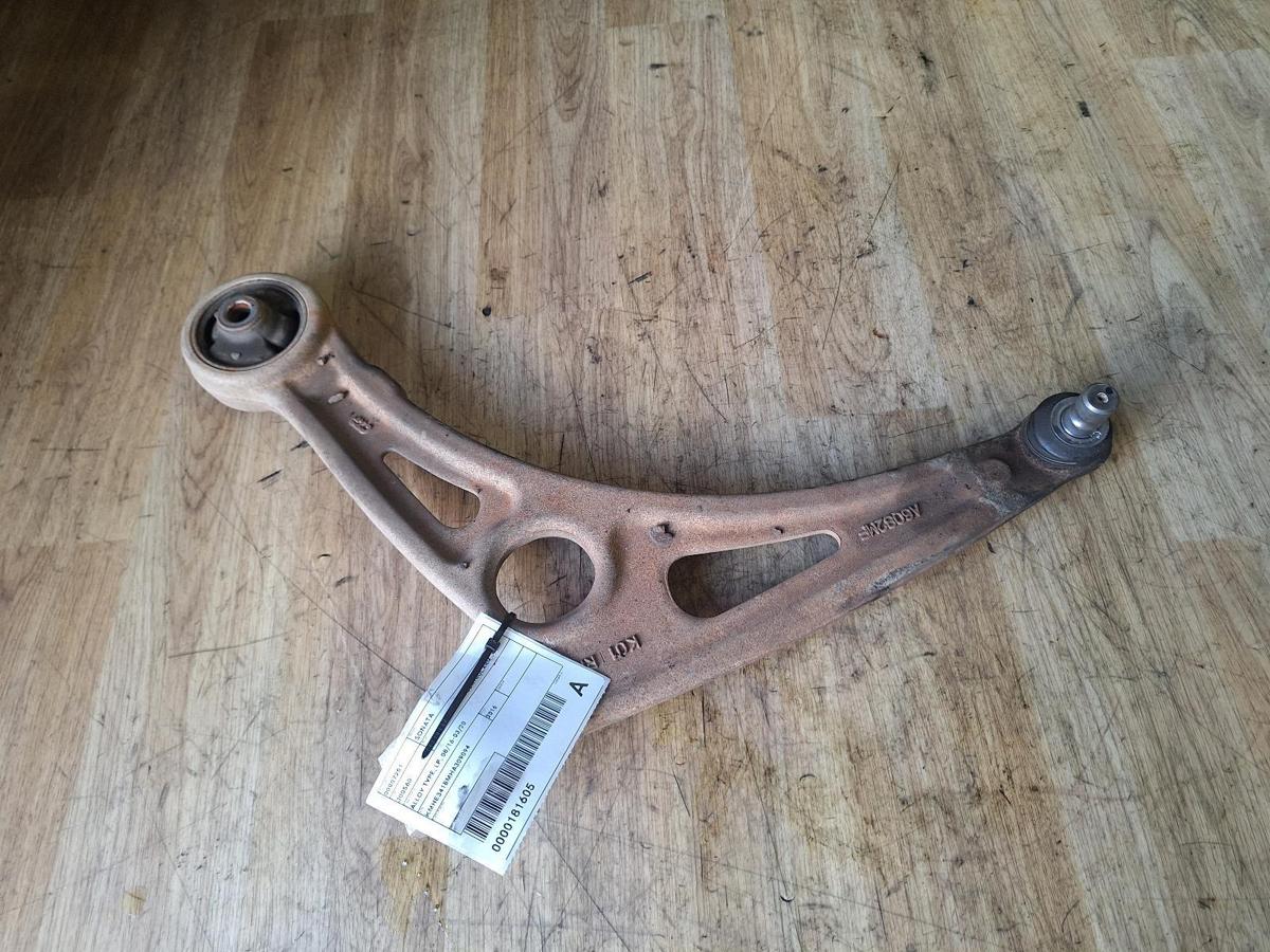 1000901947-Left Front Lower Control Arm Top