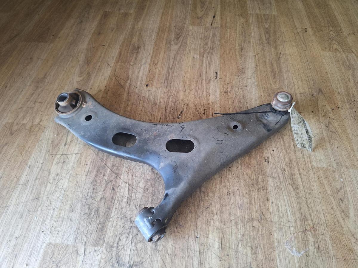 1000907891-Left Front Lower Control Arm Top