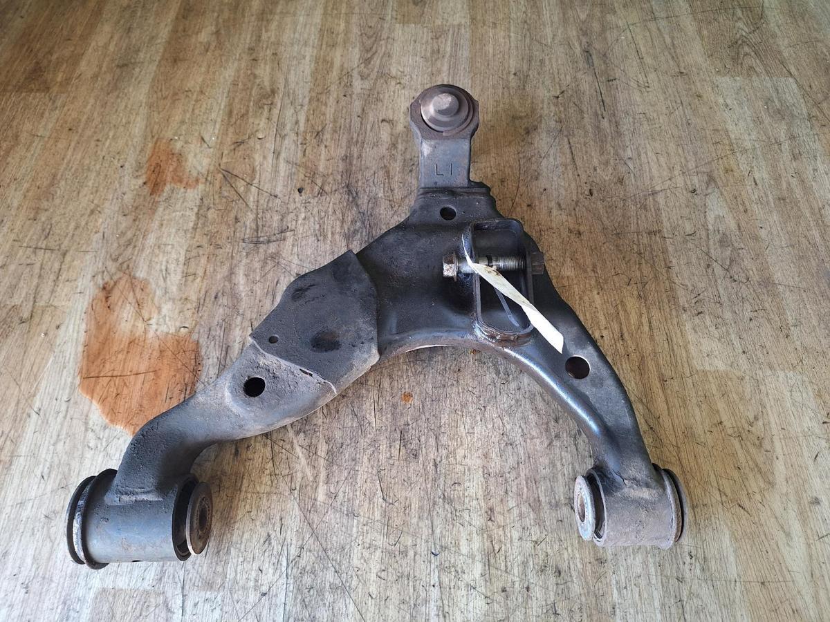 1000923271-Left Front Lower Control Arm Top