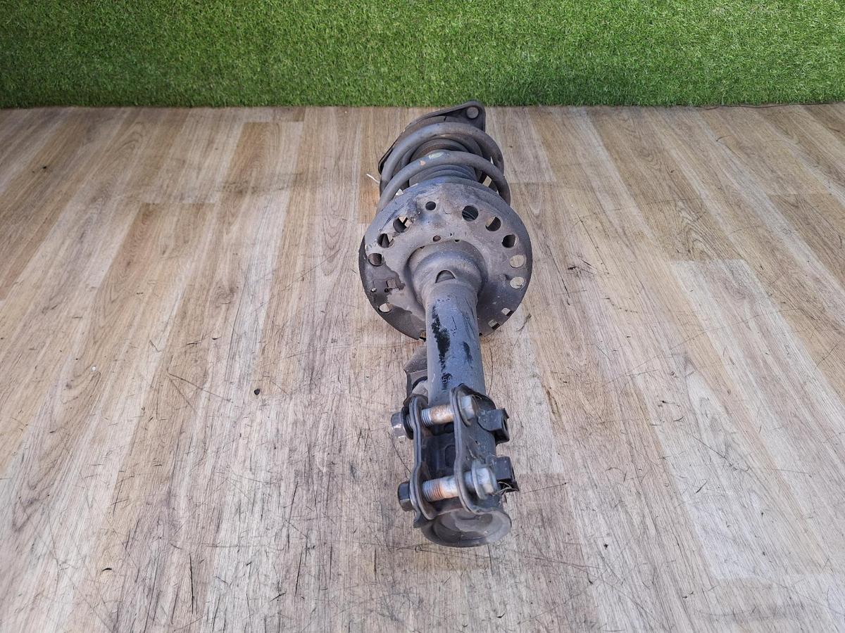 1000937185-Left Front Strut Bottom