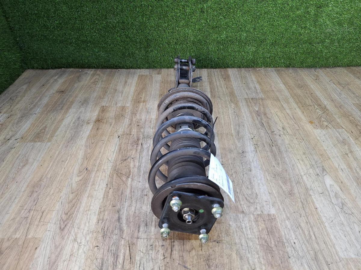 1000937423-Left Front Strut Top
