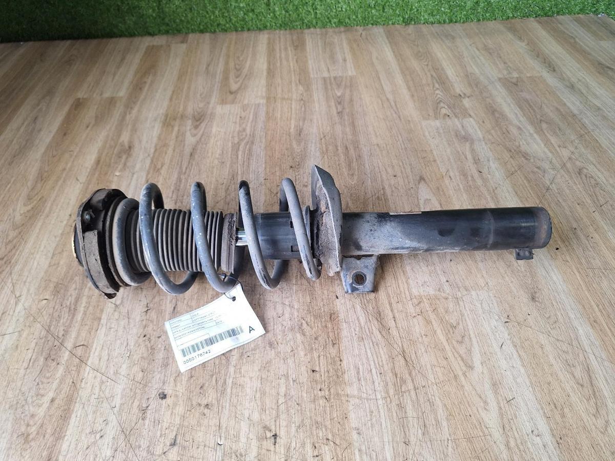 1000884832-Left Front Strut Top