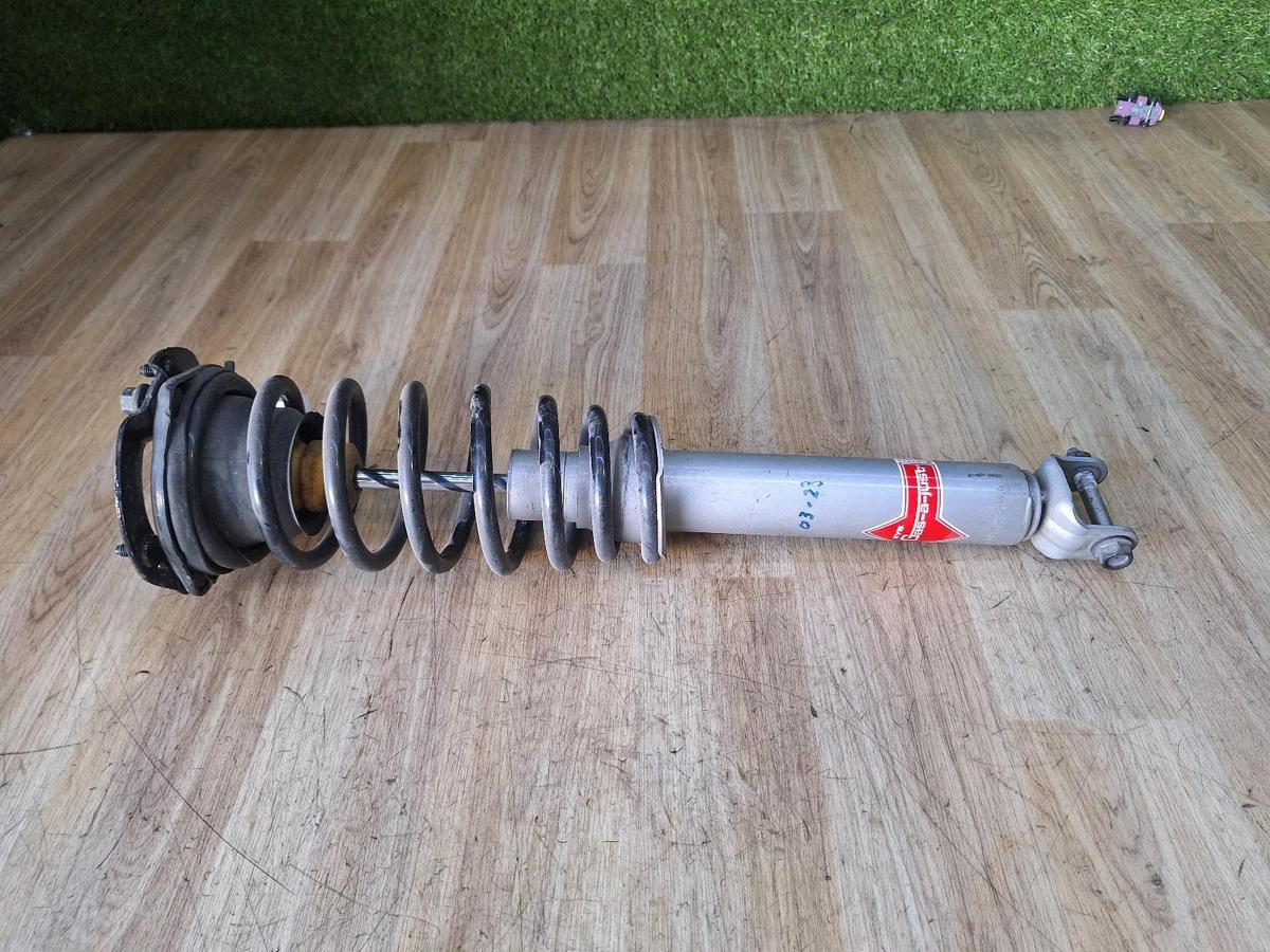 1000887510-Left Front Strut Top