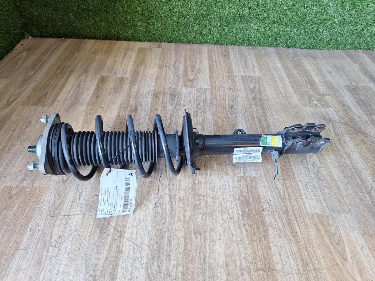 1000887869-Left Front Strut Top