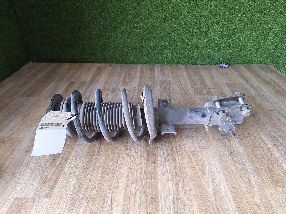 1000880086-Left Front Strut Top