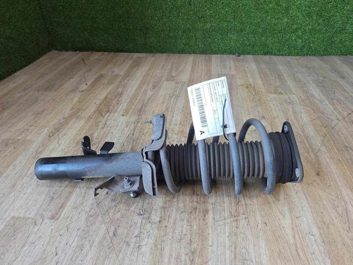 1000883033-Left Front Strut Top