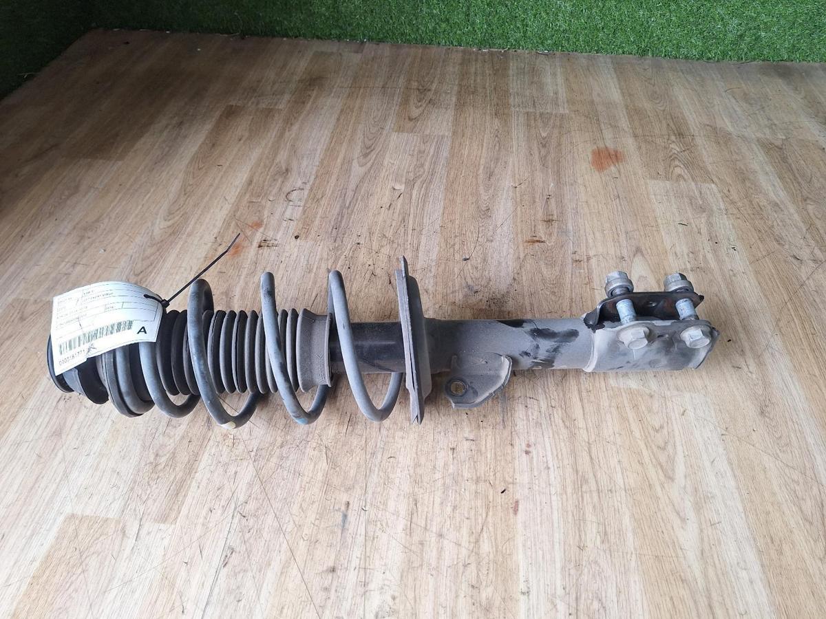 1000900949-Left Front Strut Top