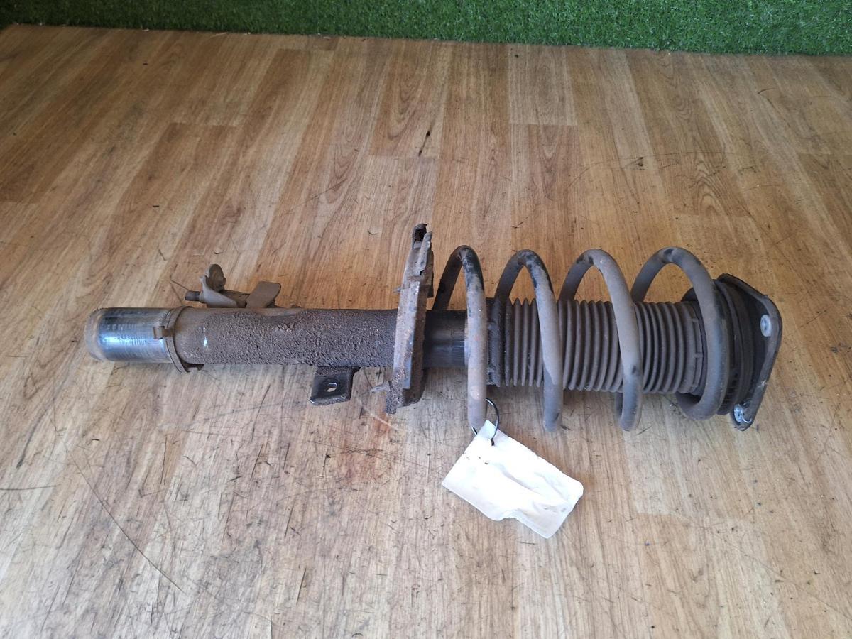 1000905749-Left Front Strut Top