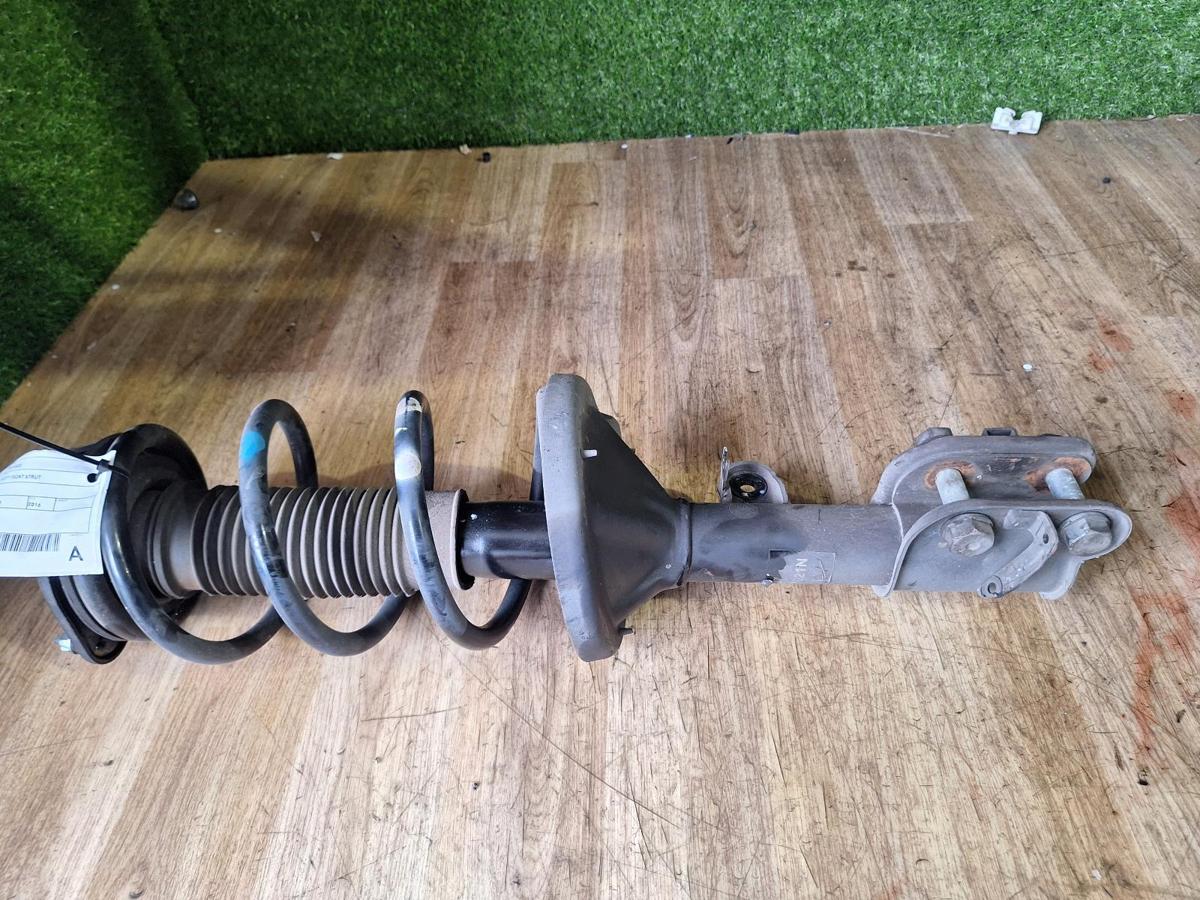 1000910594-Left Front Strut Top
