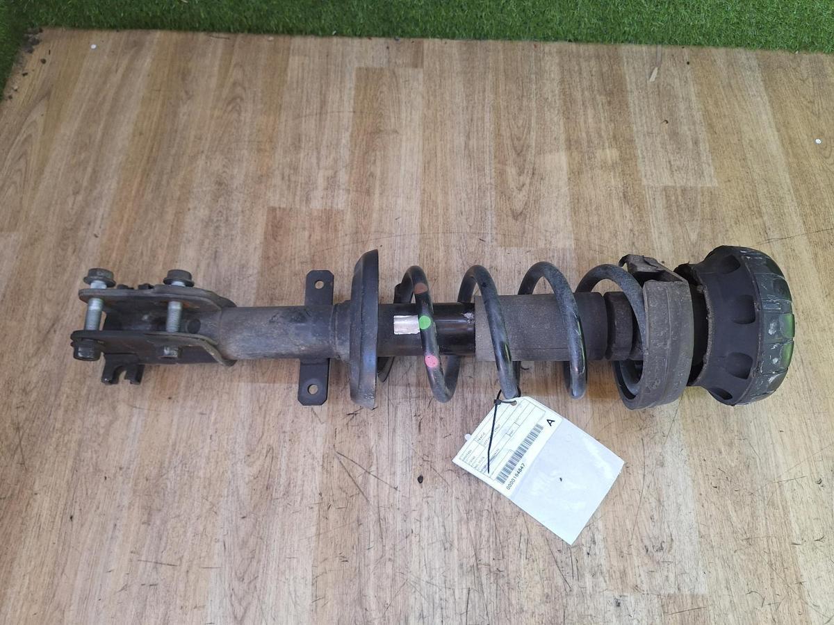 1000918632-Left Front Strut Top