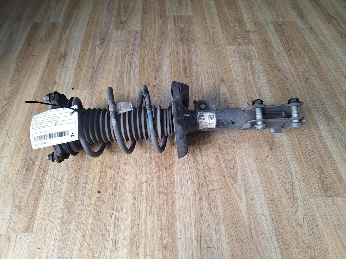 1000889614-Left Front Strut Top