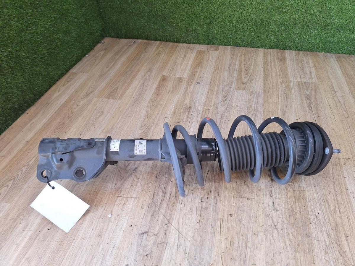 1000924425-Left Front Strut Top