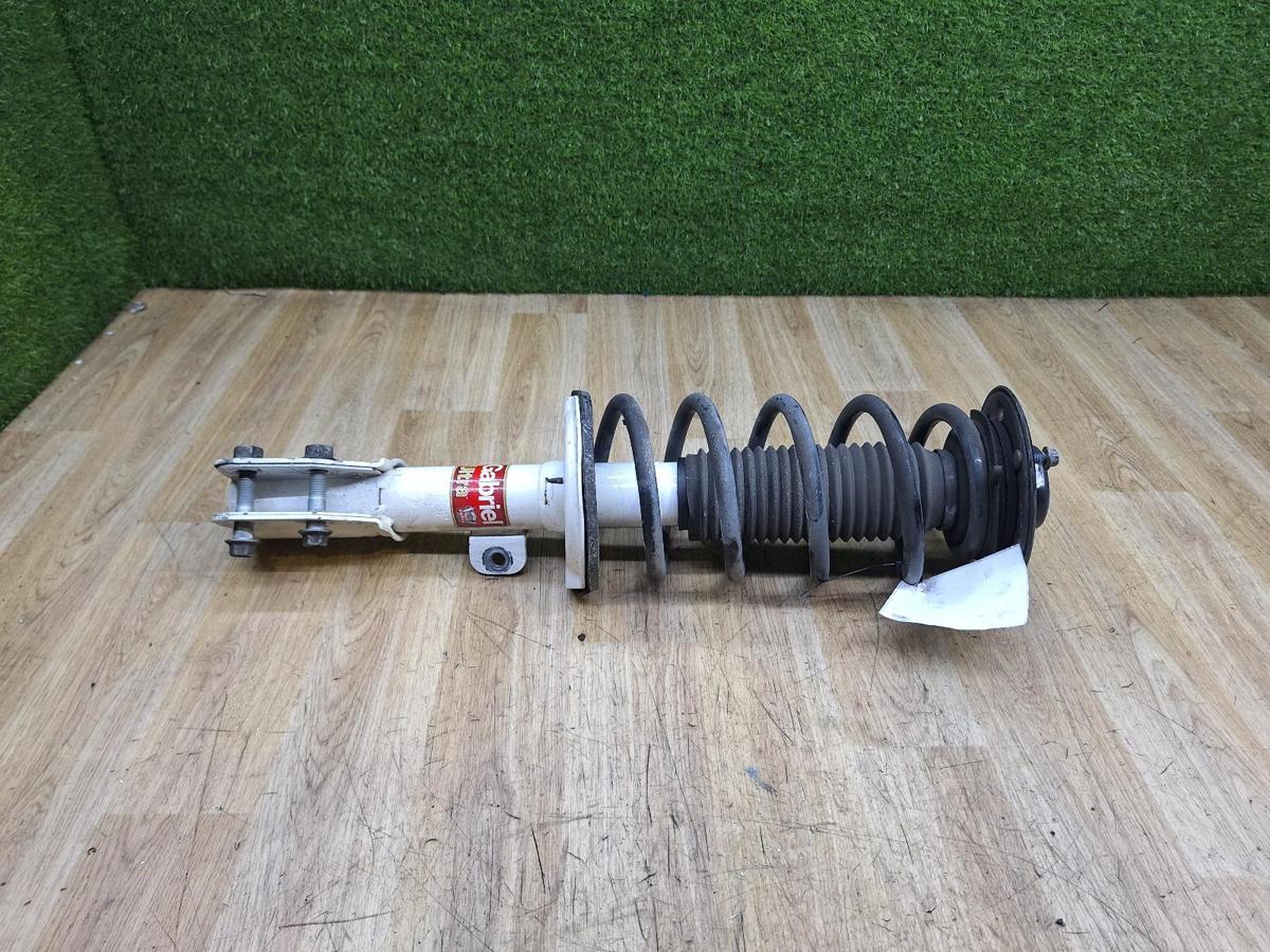 1000924573-Left Front Strut Top