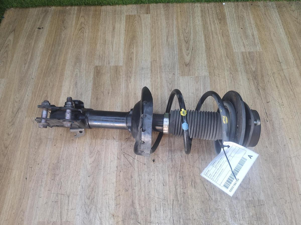 1000930848-Left Front Strut Top