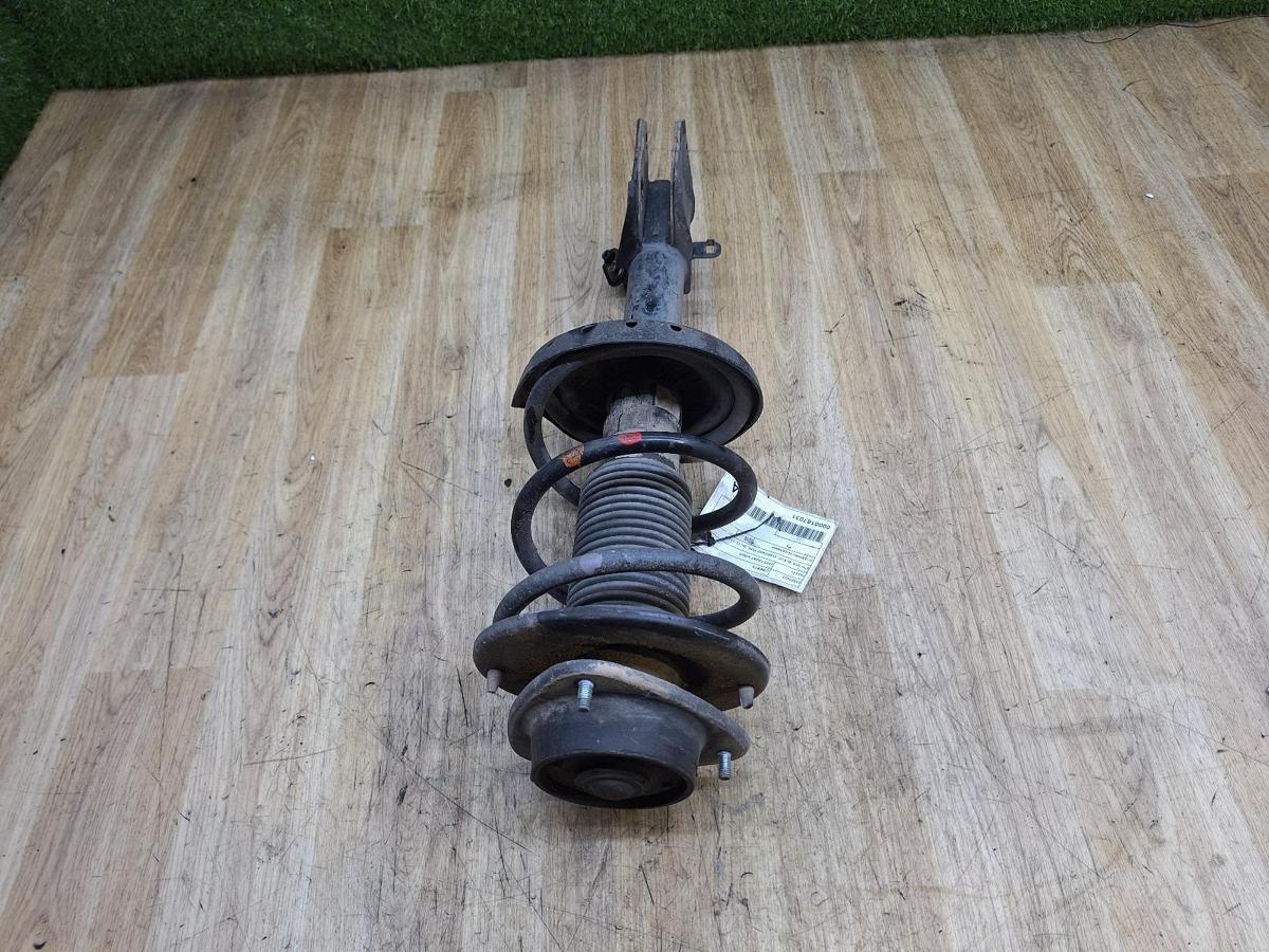 1000932361-Left Front Strut Top