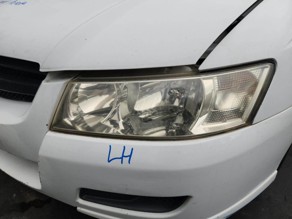 1000936473-Left Headlamp