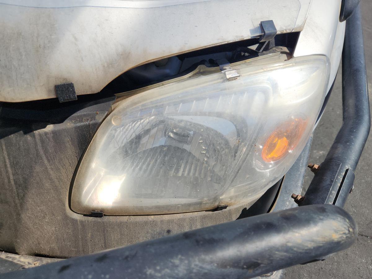 1000939800-Left Headlamp
