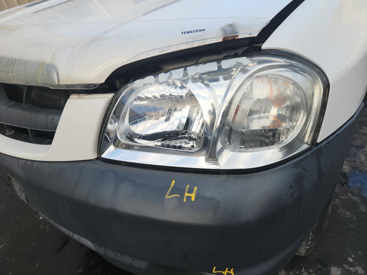 1000942580-Left Headlamp