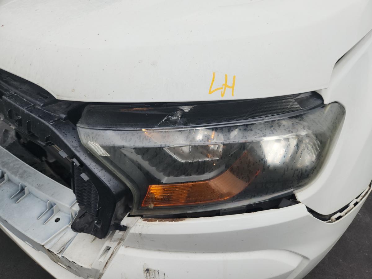 1000943036-Left Headlamp