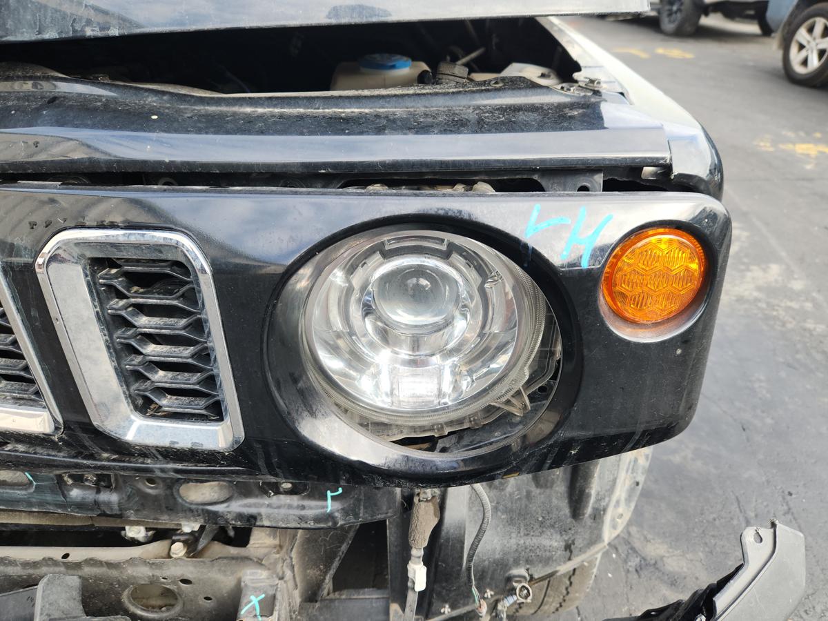 1000945407-Left Headlamp