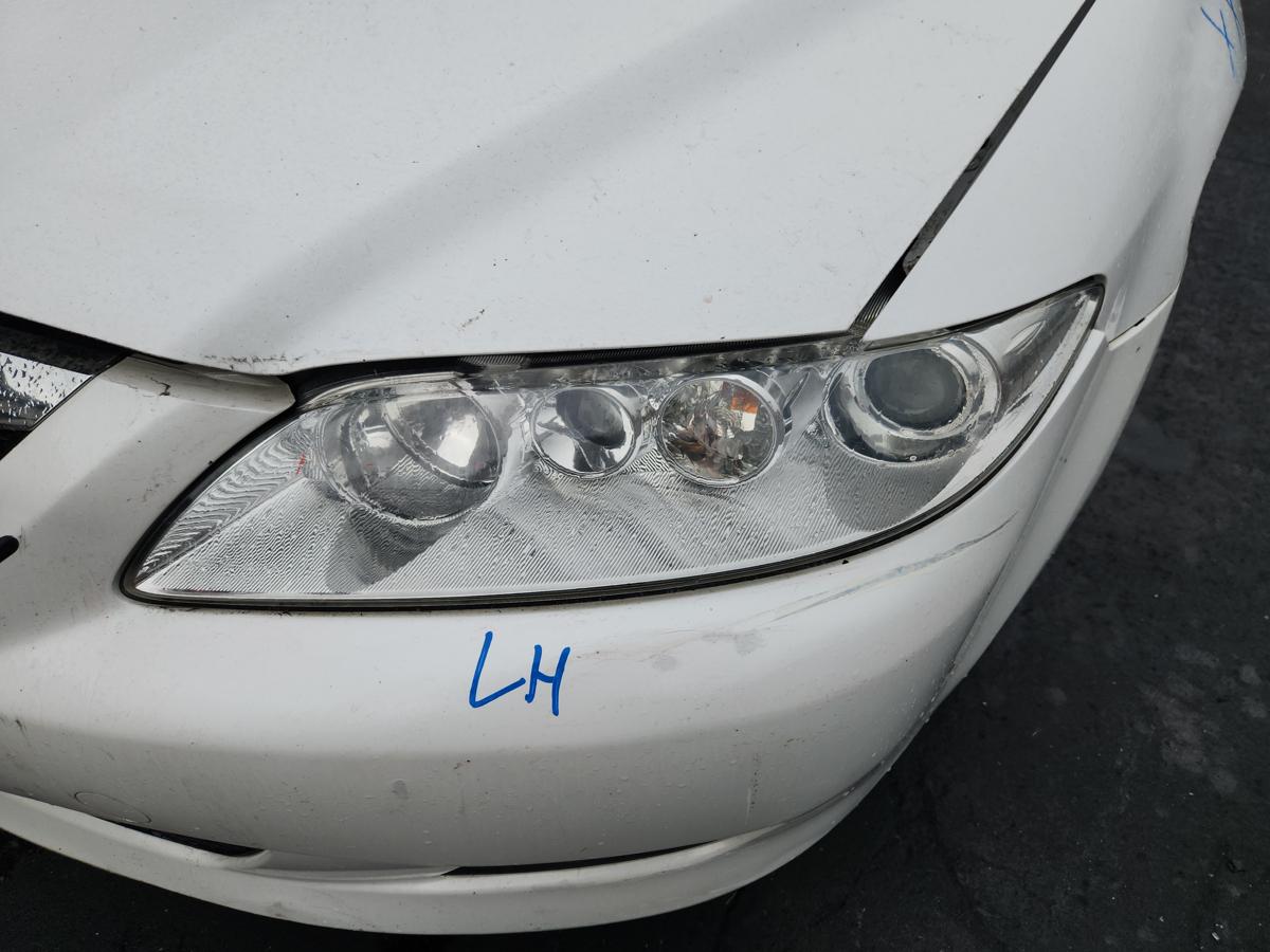 1000944857-Left Headlamp