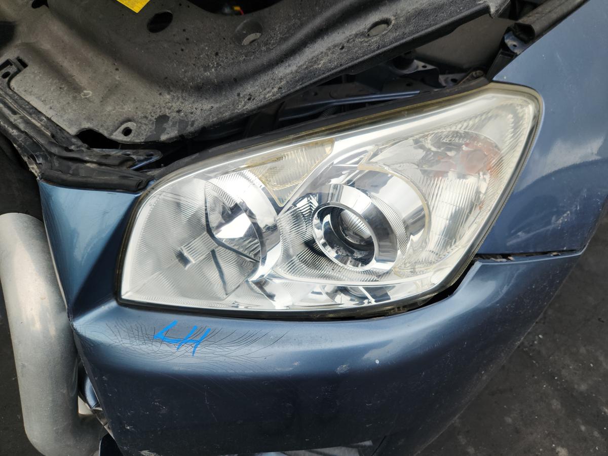 1000945621-Left Headlamp