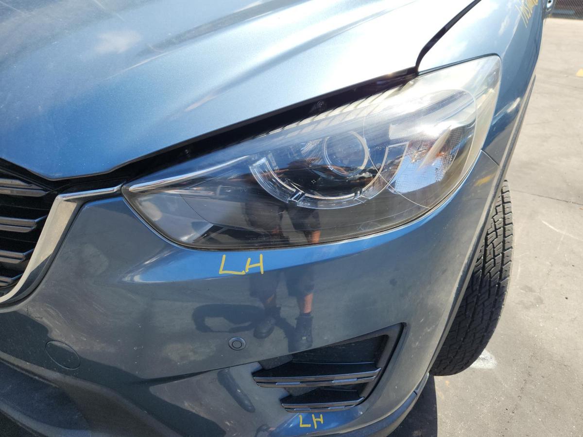 1000826541-Left Headlamp