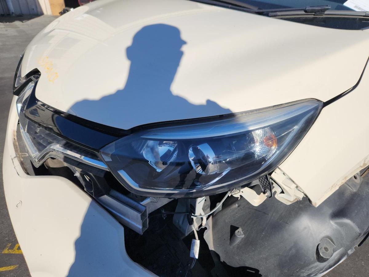 1000849256-Left Headlamp