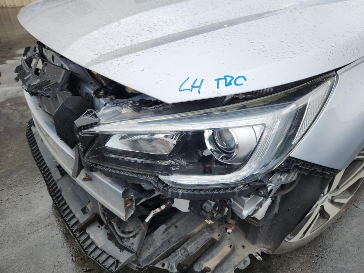 1000861257-Left Headlamp