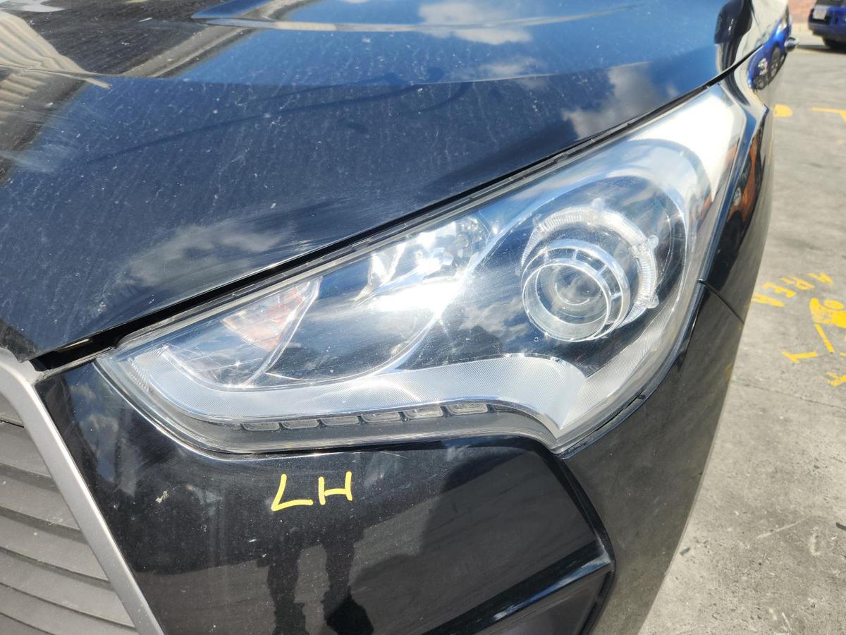 1000875713-Left Headlamp