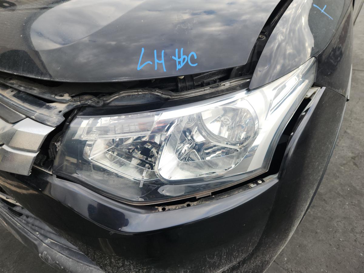 1000937009-Left Headlamp