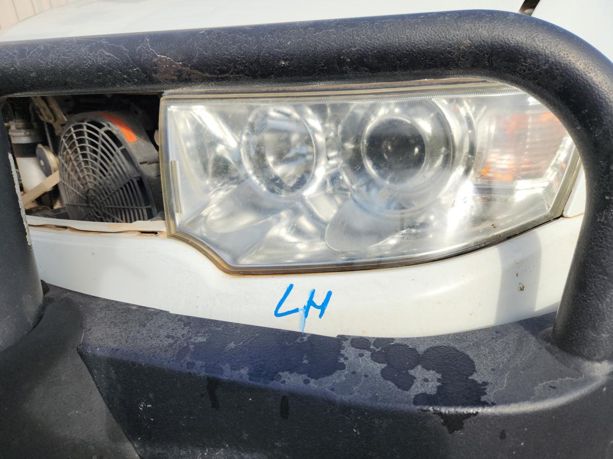 1000938761-Left Headlamp