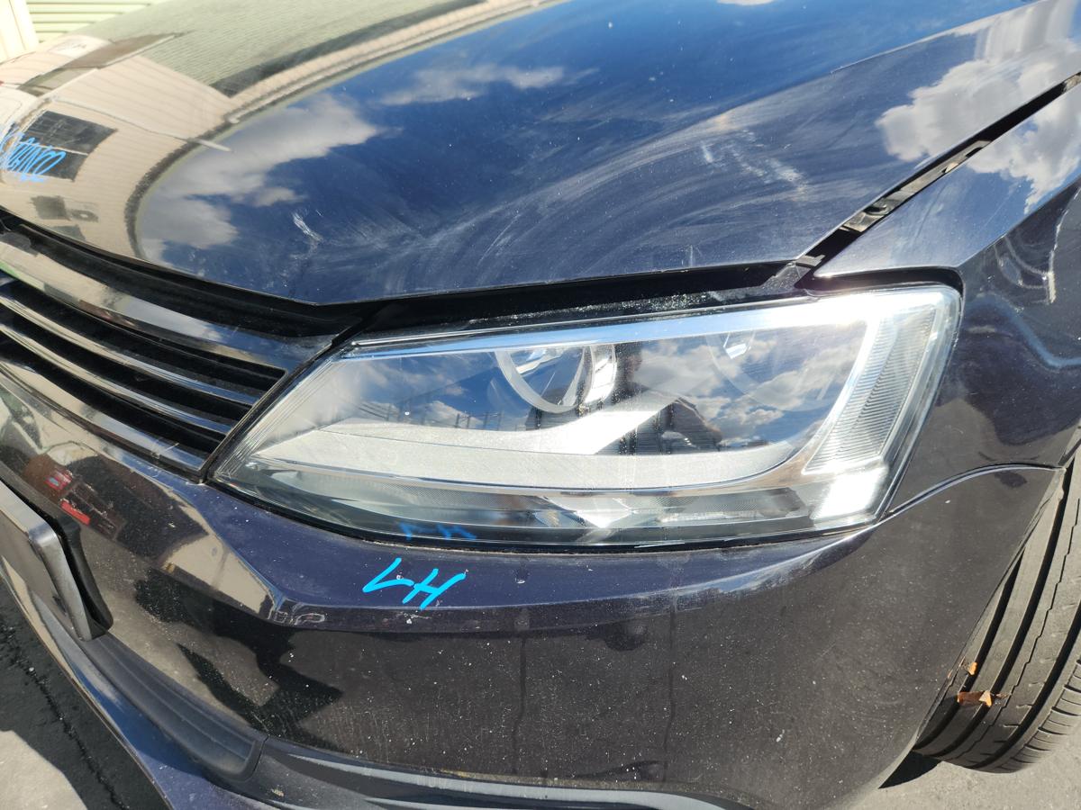 1000939653-Left Headlamp