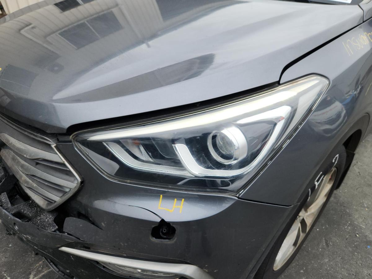 1000833411-Left Headlamp